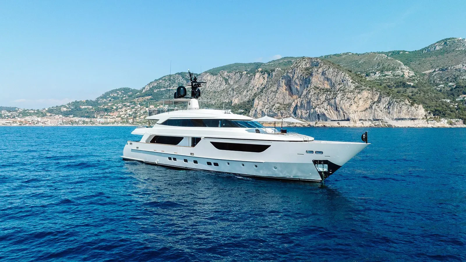 a white yacht in the water aboard AWAY Yacht for Charter