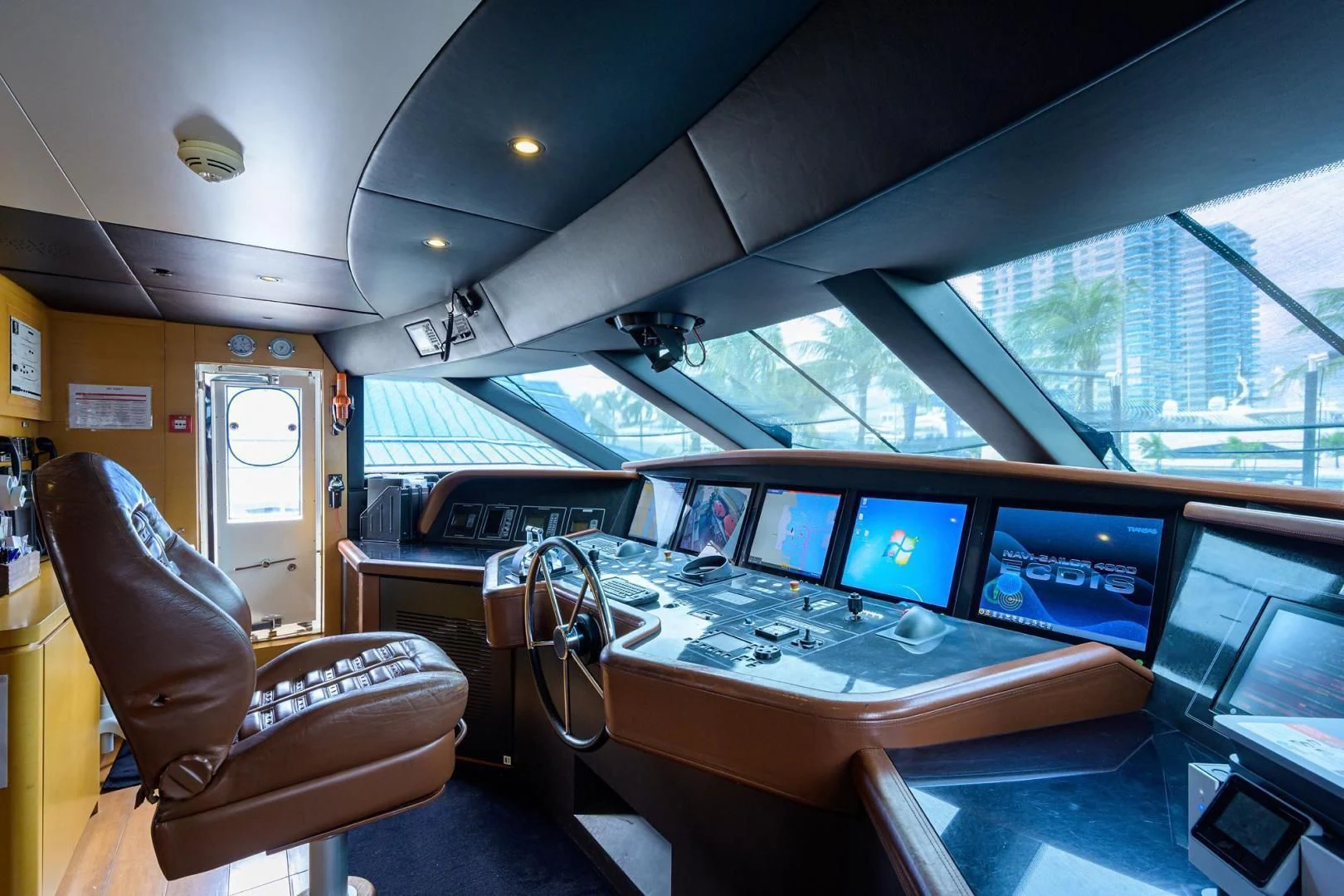 a room with many computers aboard AWAY Yacht for Charter