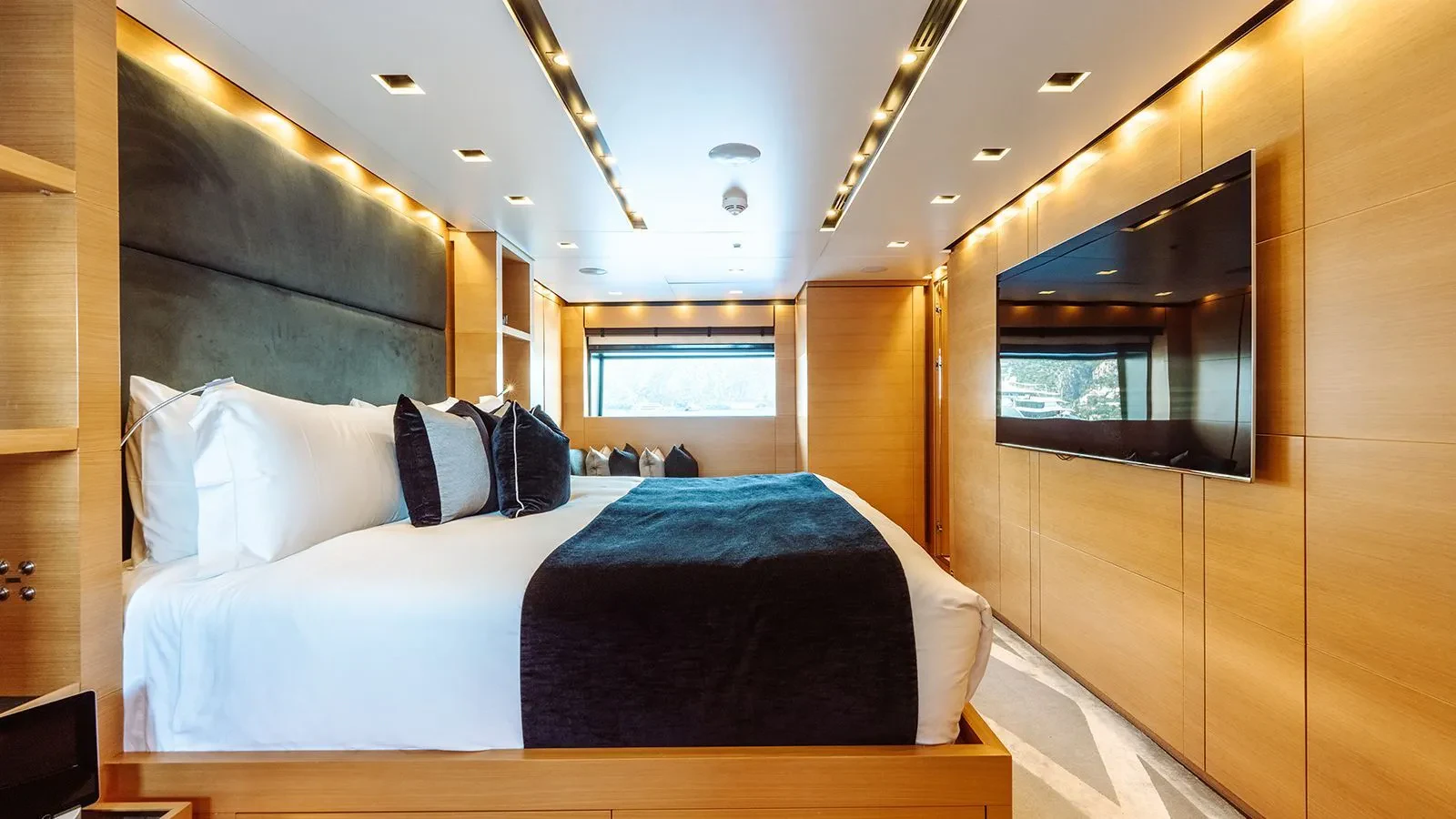 a bed in a room aboard AWAY Yacht for Charter