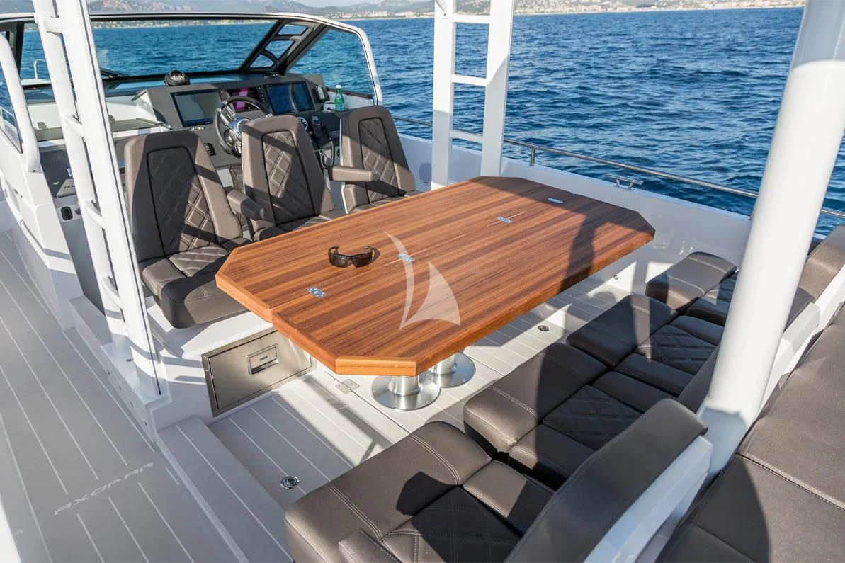 a wooden boat on the water aboard AWAY Yacht for Charter