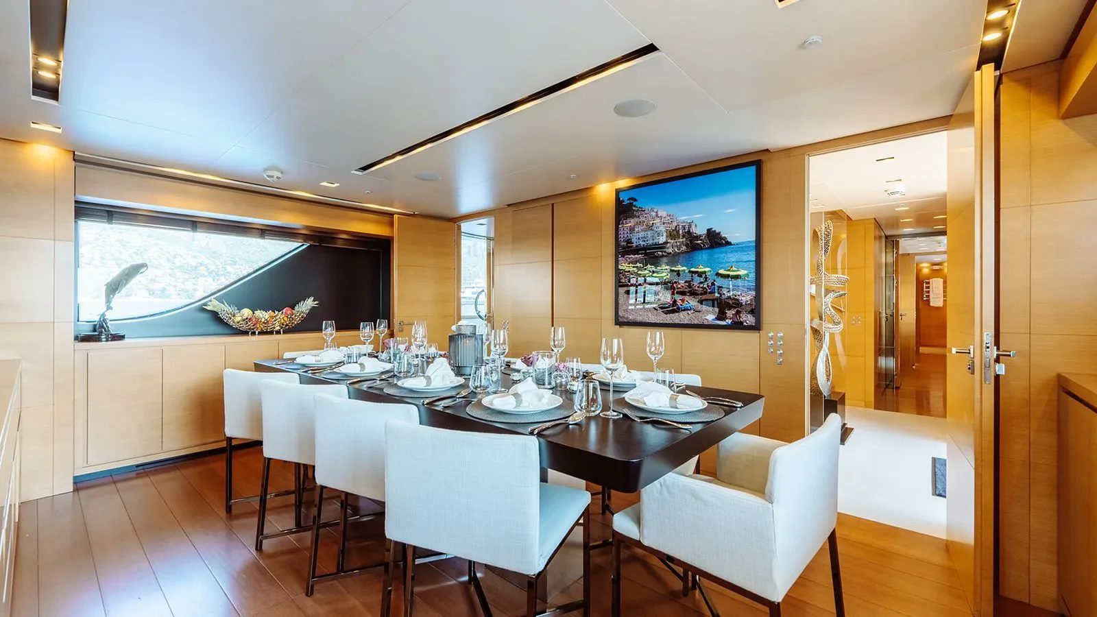 a dining room with a table and chairs aboard AWAY Yacht for Charter
