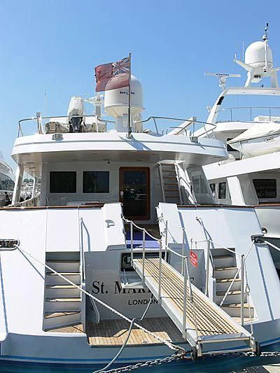 a boat with a flag on the front aboard BACHATA QUEEN Yacht for Sale
