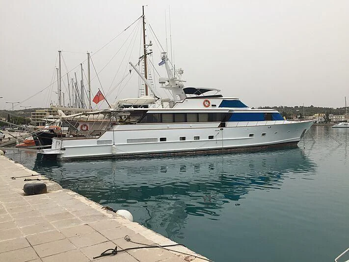 a boat docked at a pier aboard ANASTASIA D Yacht for Sale