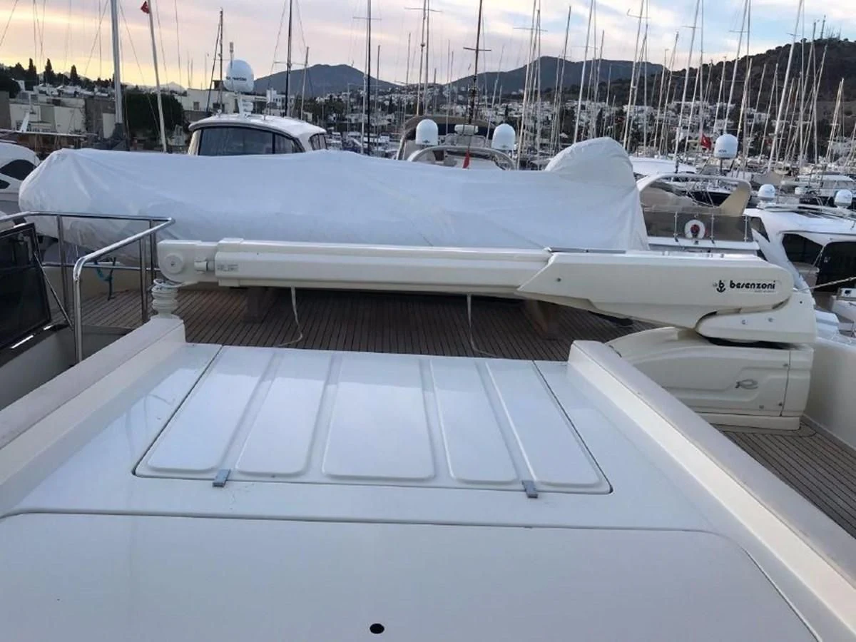 a row of boats on a deck aboard BLACK SWAN Yacht for Sale