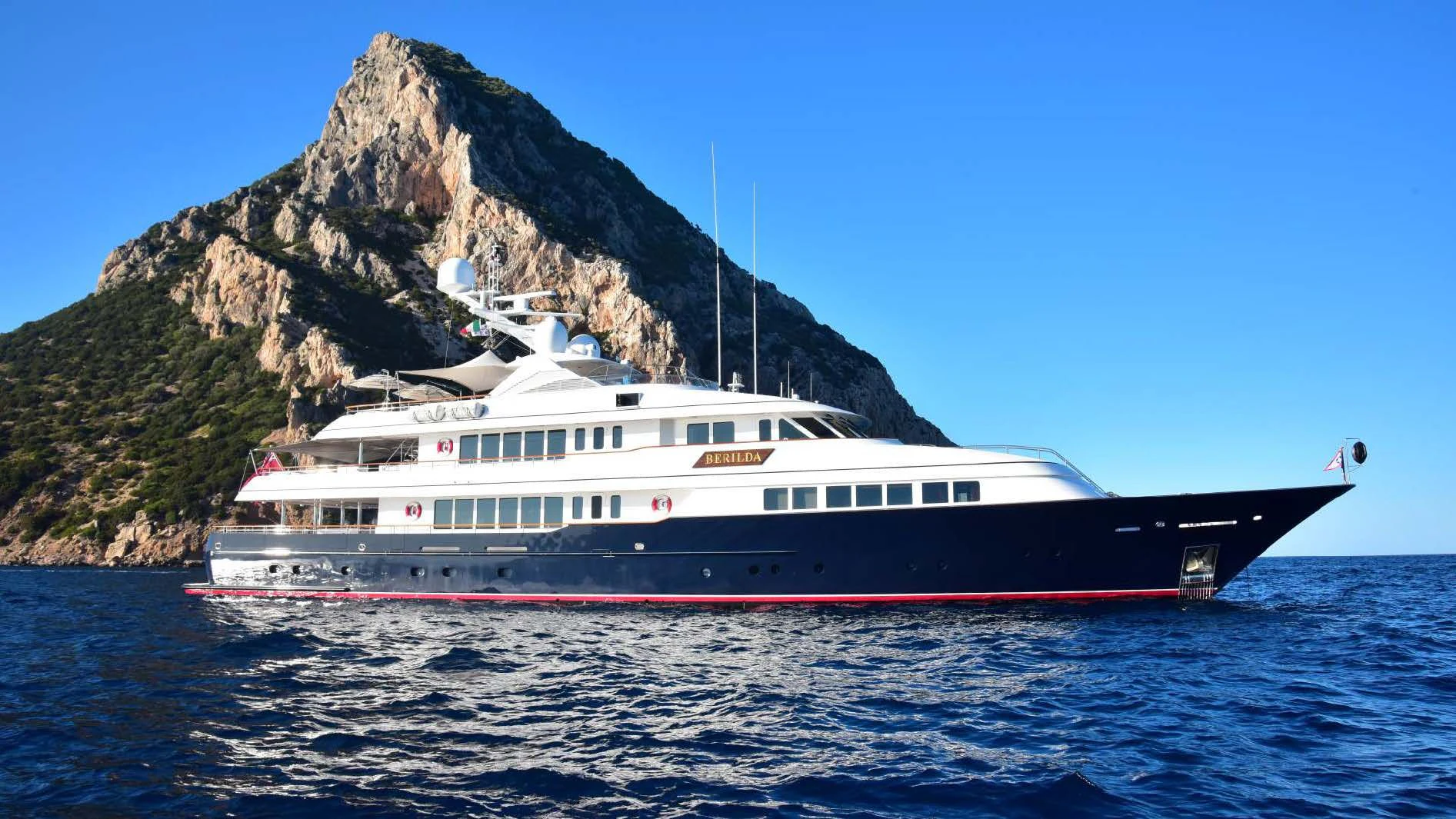 a large boat on the water aboard HALCYON Yacht for Sale