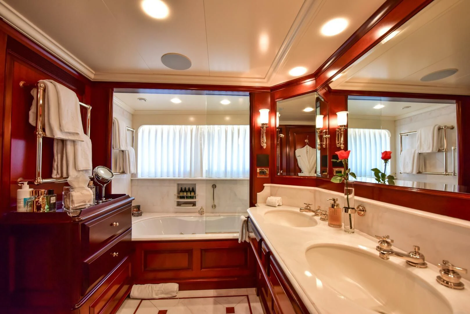 a bathroom with a large mirror aboard HALCYON Yacht for Sale