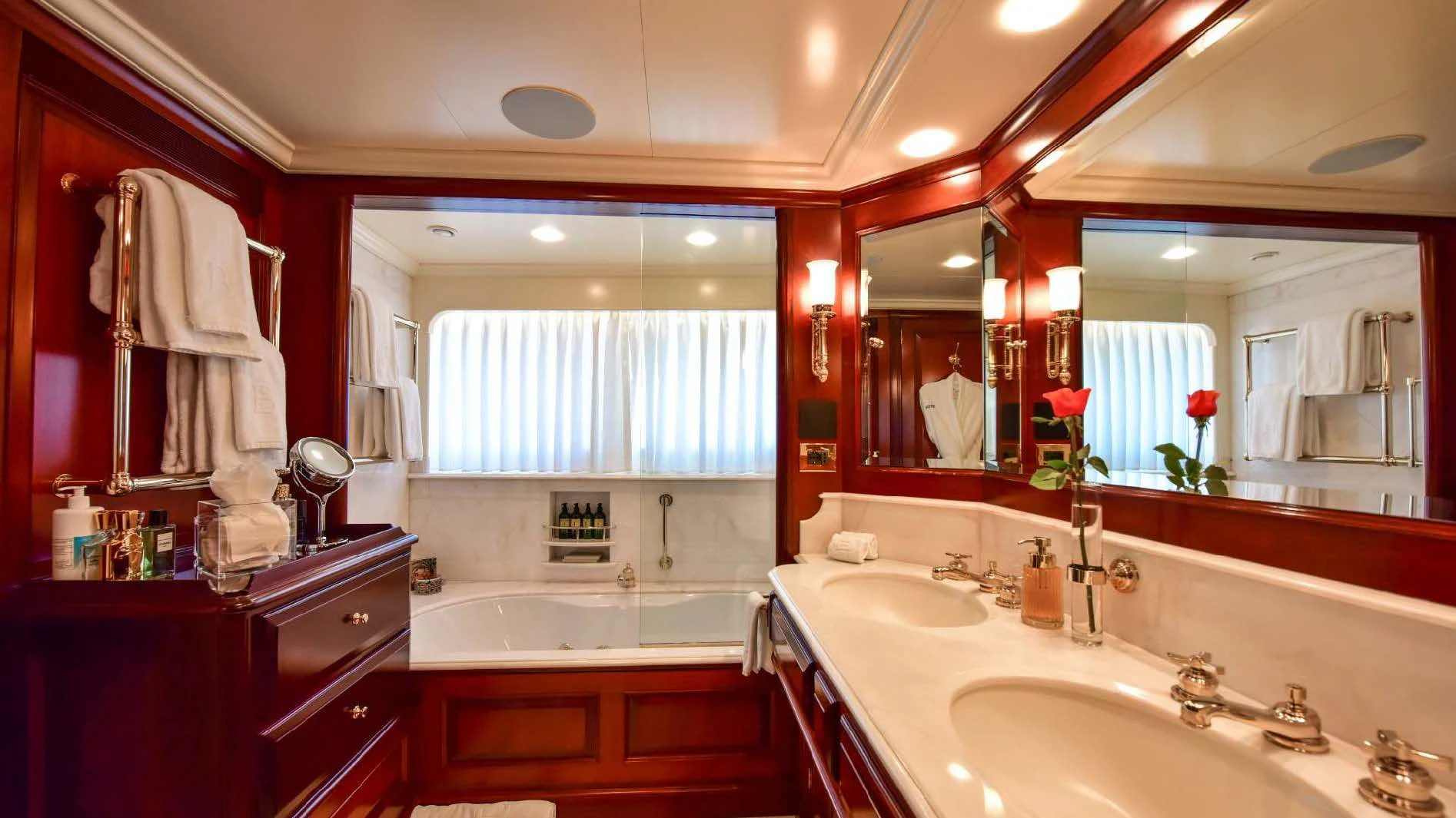 a bathroom with a large mirror aboard HALCYON Yacht for Sale