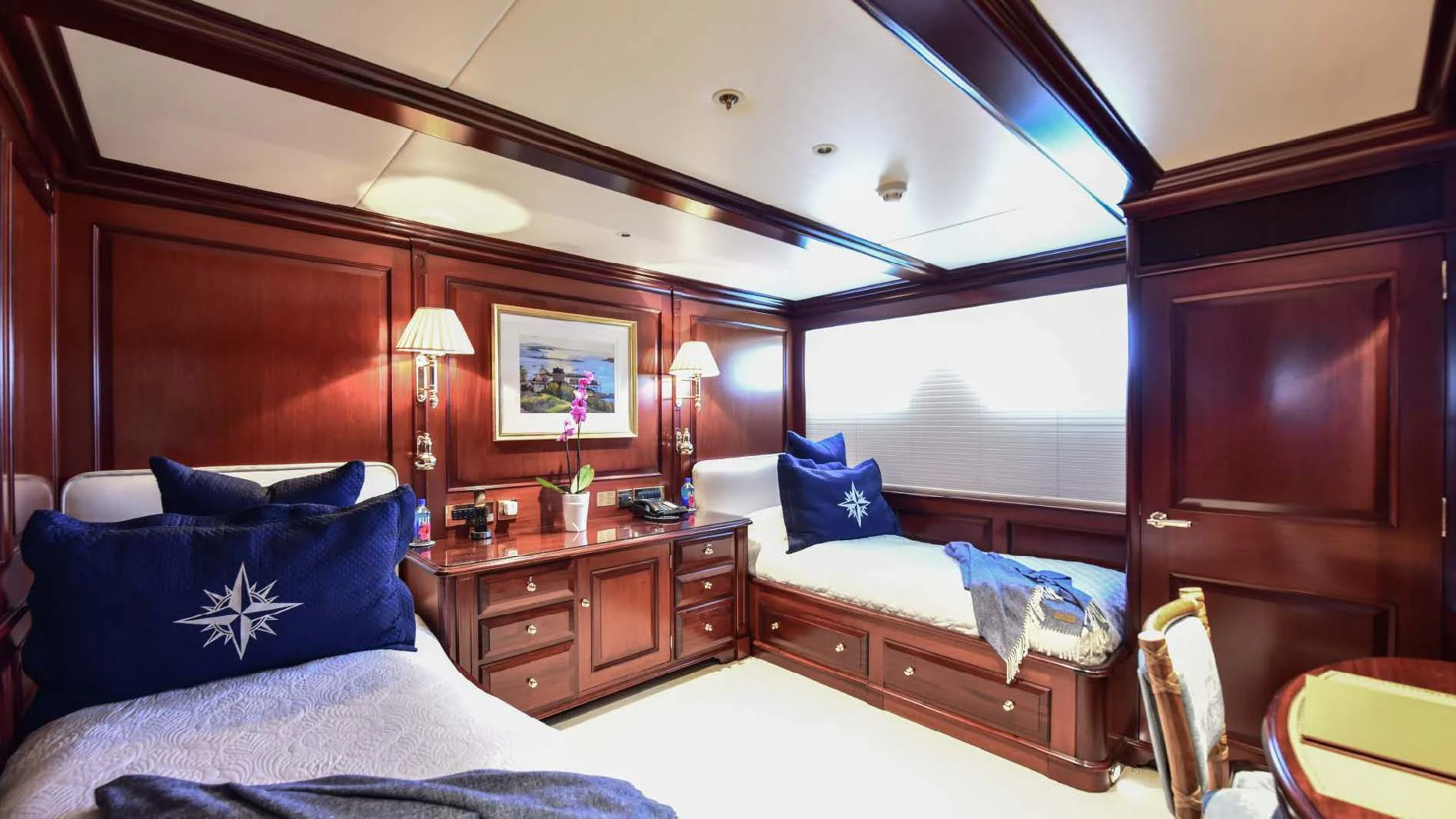 a room with a bed and a desk aboard HALCYON Yacht for Sale