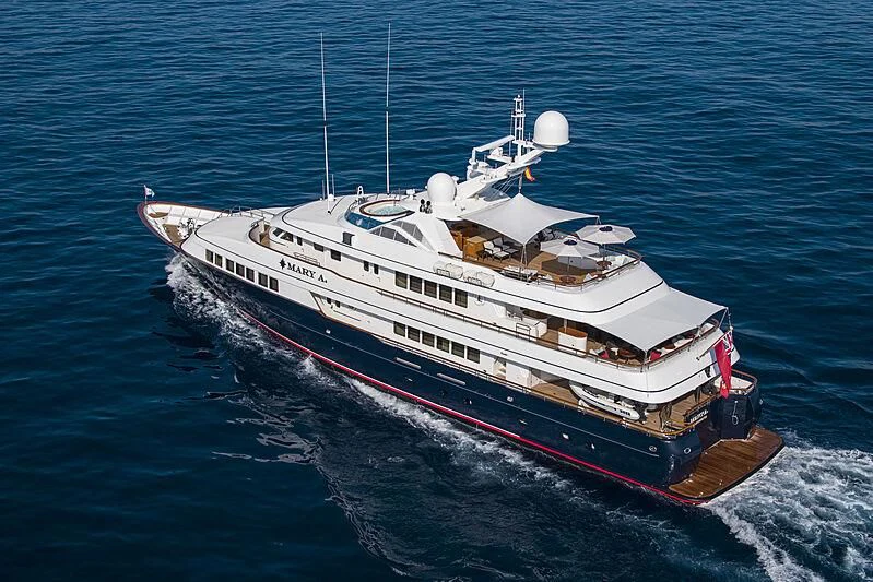 a large ship in the water aboard HALCYON Yacht for Sale