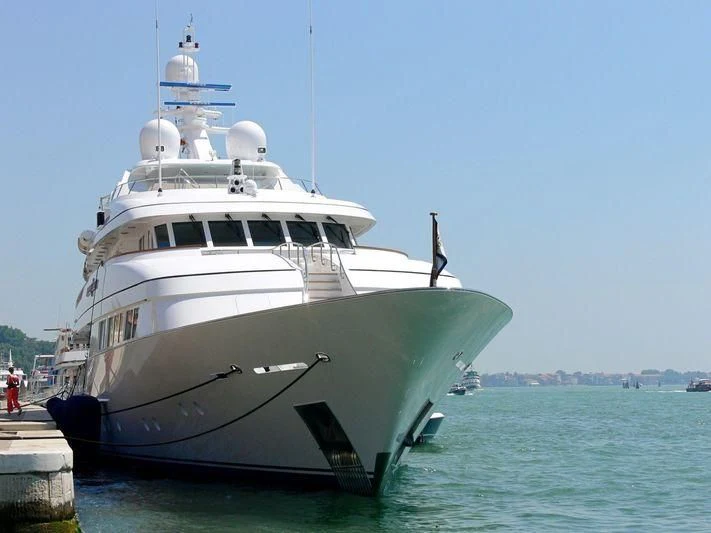a large white boat in the water aboard HALCYON Yacht for Sale