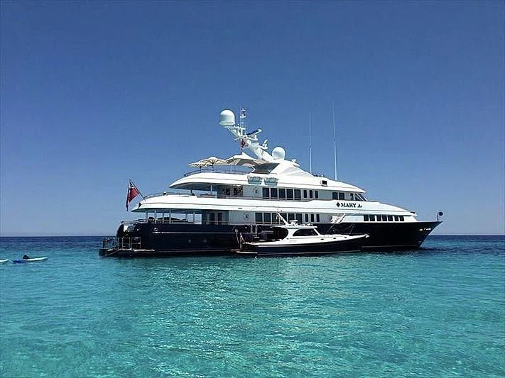 a large boat in the water aboard HALCYON Yacht for Sale