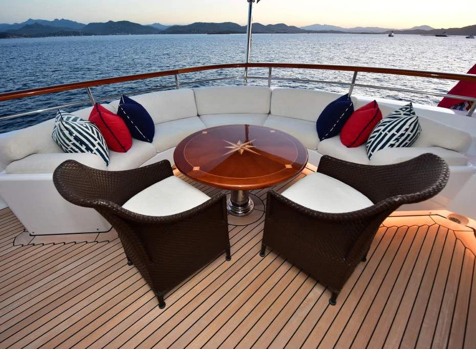 a group of hats on a deck overlooking a body of water aboard HALCYON Yacht for Sale
