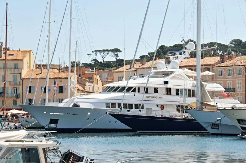 several boats docked in a harbor aboard HALCYON Yacht for Sale