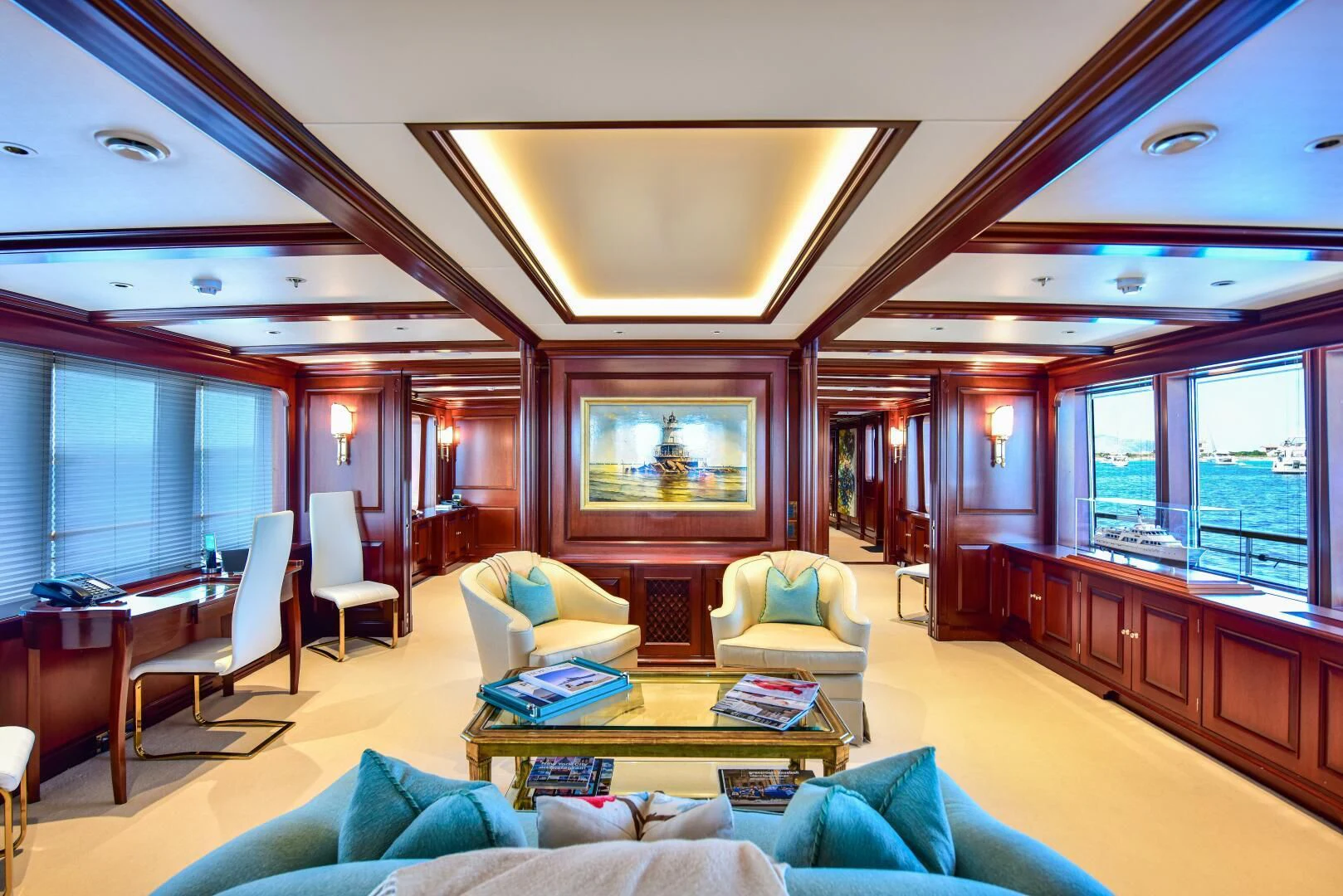 a living room with a large window aboard HALCYON Yacht for Sale