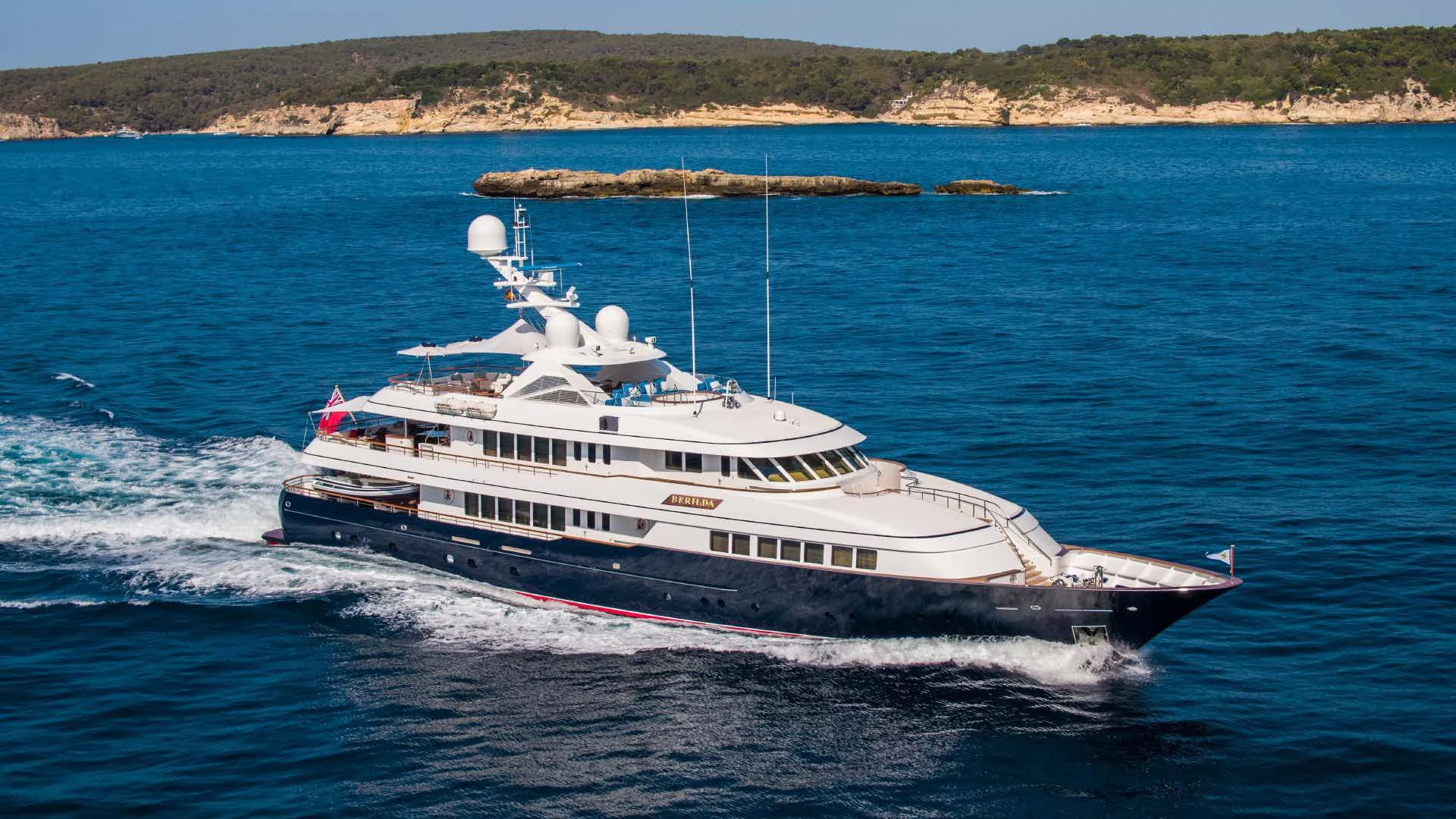 a large boat on the water aboard HALCYON Yacht for Sale