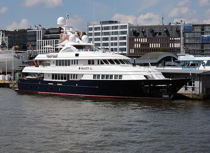a large boat in the water aboard HALCYON Yacht for Sale