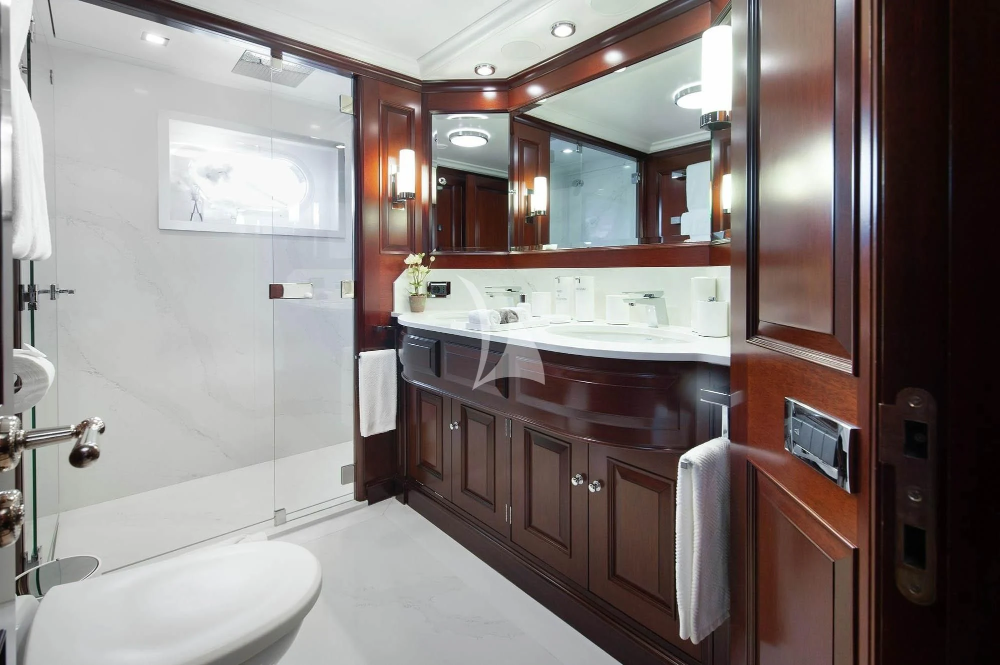 a bathroom with a large mirror aboard HALCYON Yacht for Sale