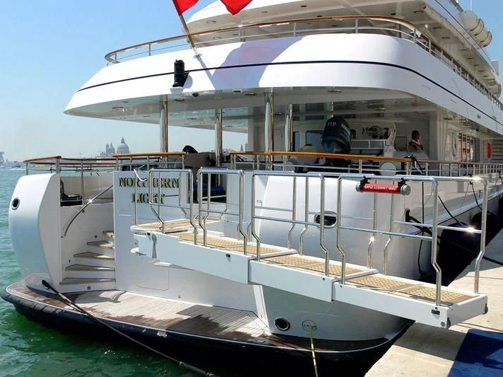 a boat with a person on the deck aboard HALCYON Yacht for Sale