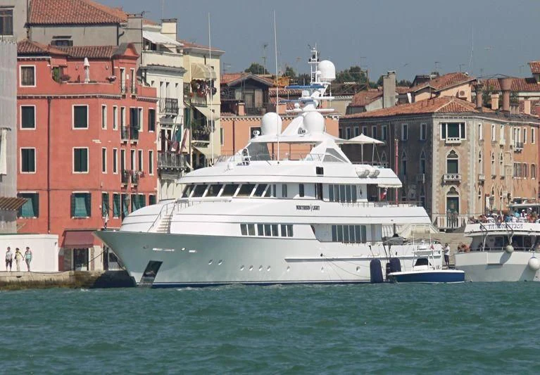 a white boat in the water aboard HALCYON Yacht for Sale