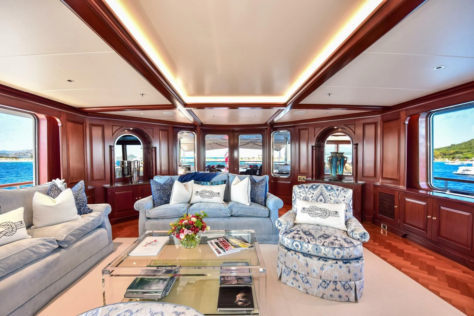 a living room with a large window aboard HALCYON Yacht for Sale