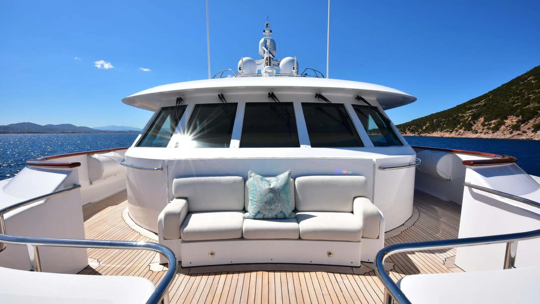 a white car on a boat aboard HALCYON Yacht for Sale
