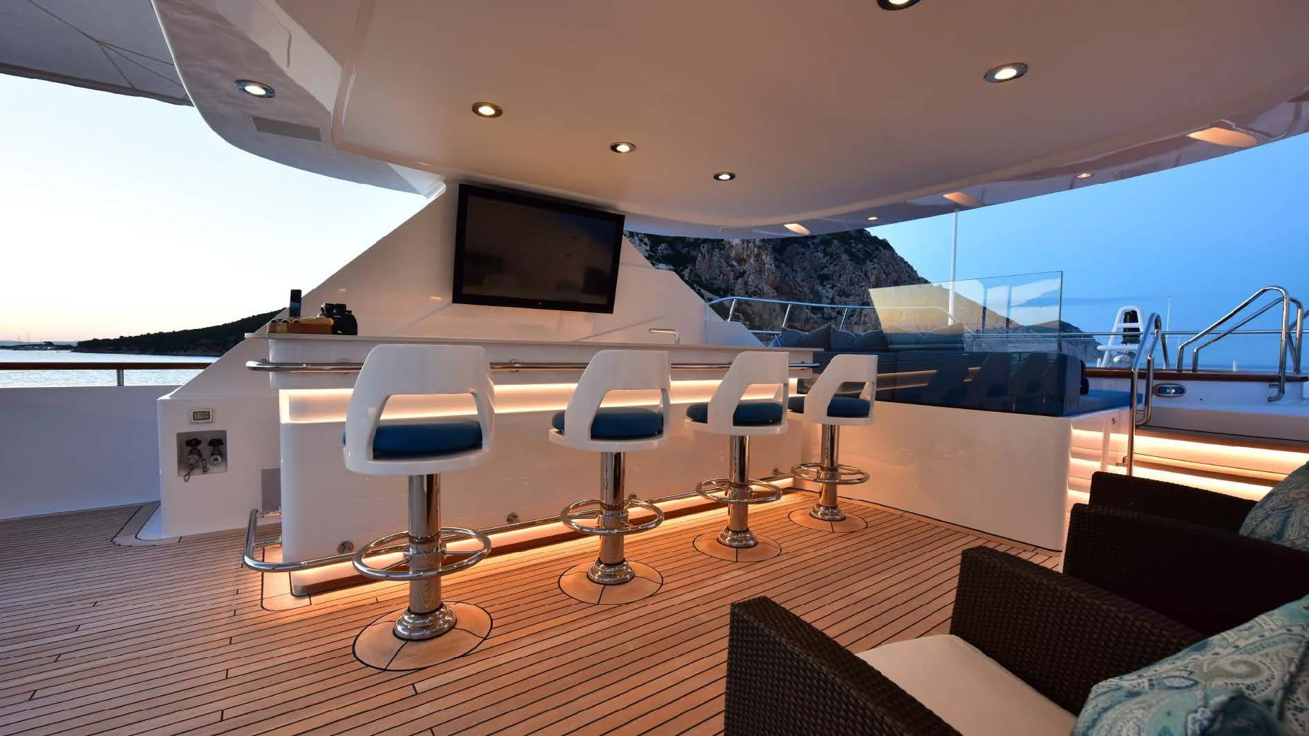 a room with a table and chairs aboard HALCYON Yacht for Sale