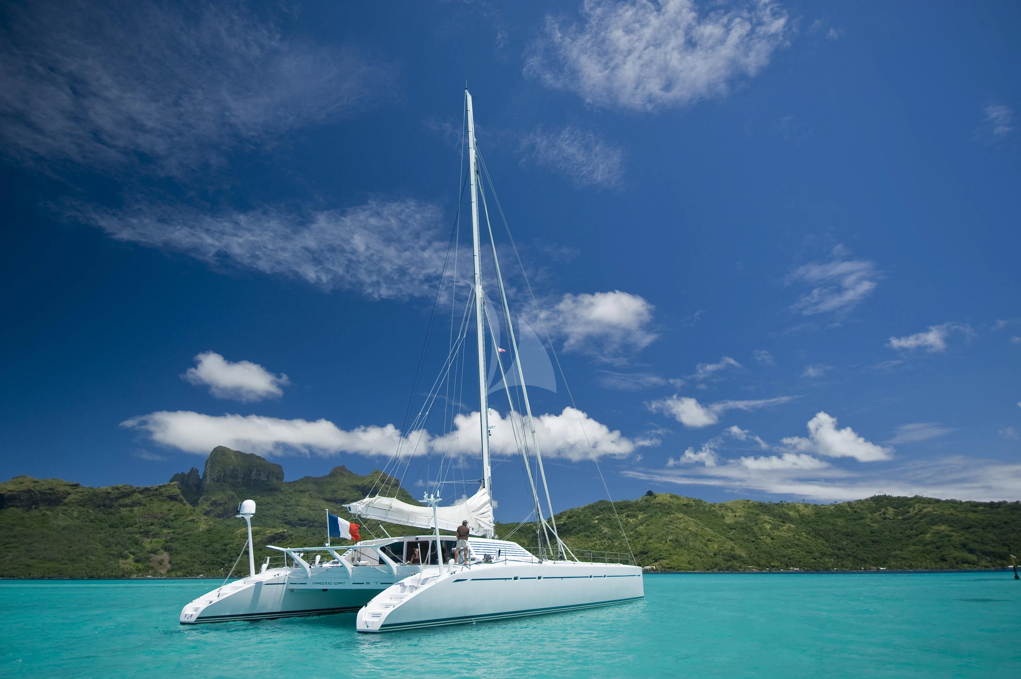 a boat in the water aboard MAGIC CAT Yacht for Sale