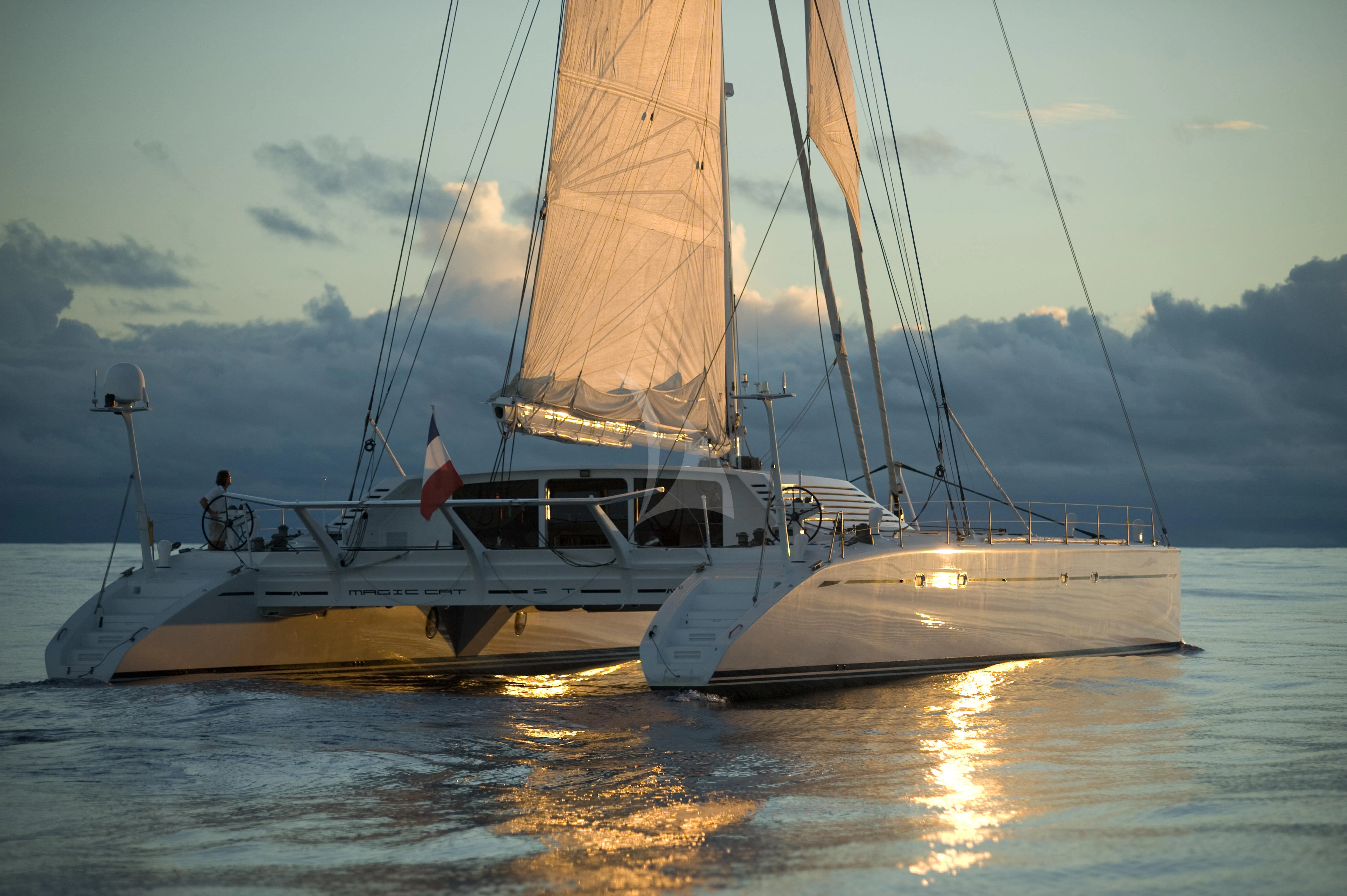 a sailboat on the water aboard MAGIC CAT Yacht for Sale