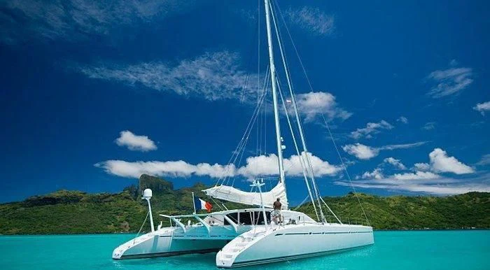 a boat on the water aboard MAGIC CAT Yacht for Sale