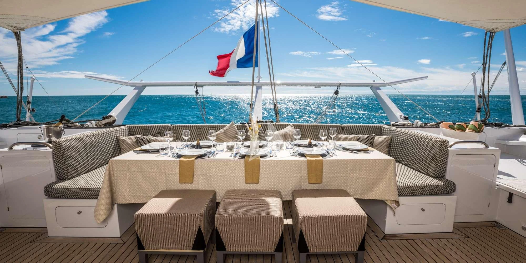 a table on a boat aboard MAGIC CAT Yacht for Sale