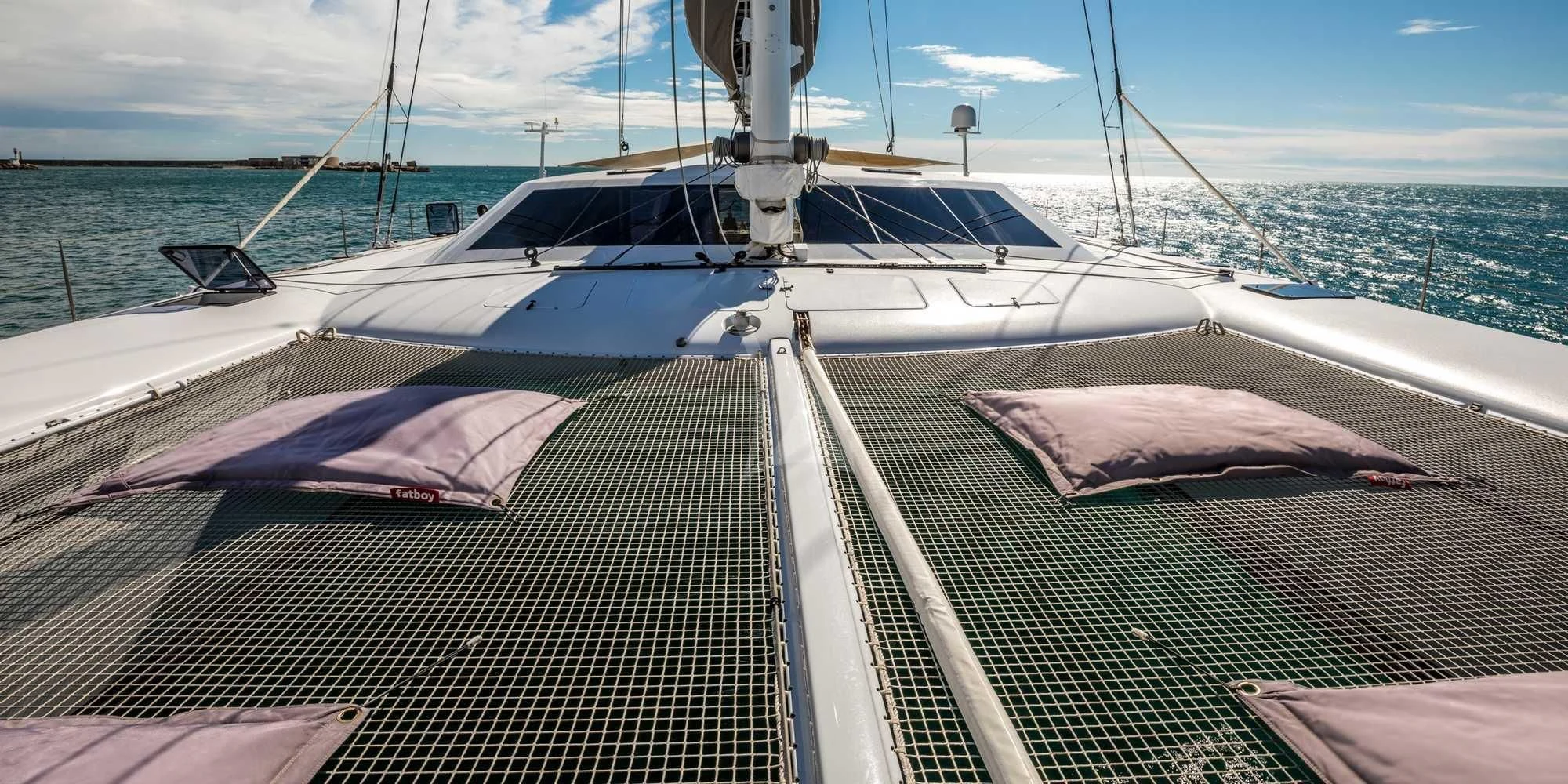 a boat on the water aboard MAGIC CAT Yacht for Sale