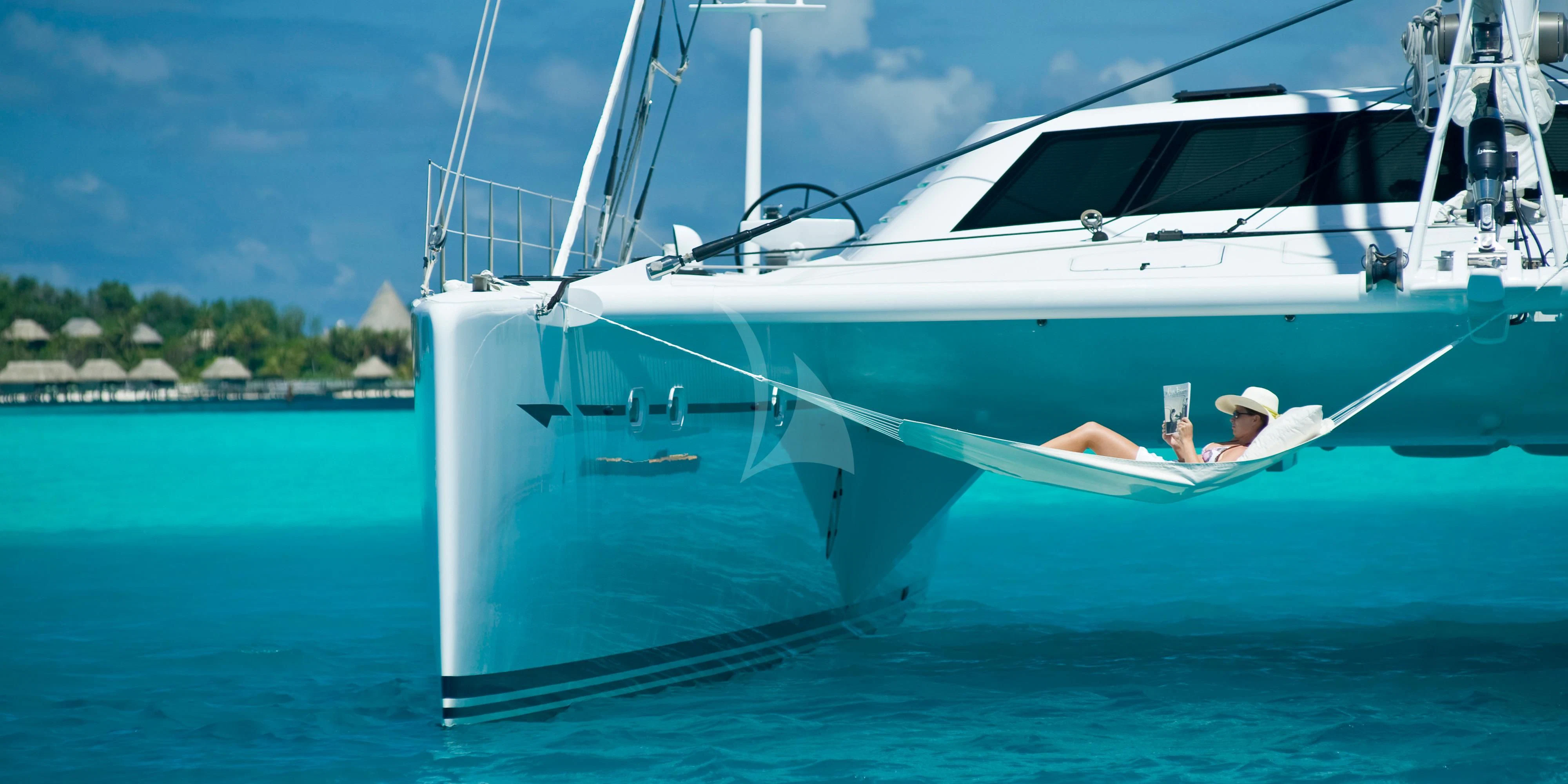 a person on a yacht aboard MAGIC CAT Yacht for Sale