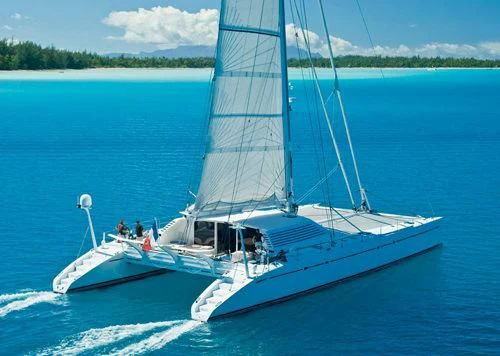 a boat on the water aboard MAGIC CAT Yacht for Sale