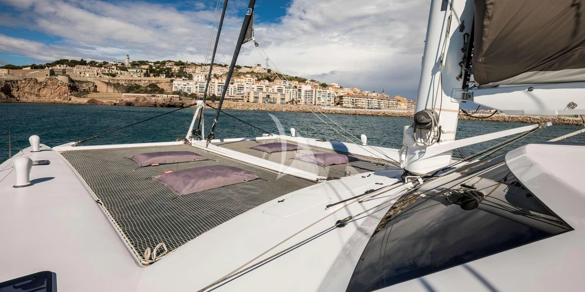 a boat on the water aboard MAGIC CAT Yacht for Sale