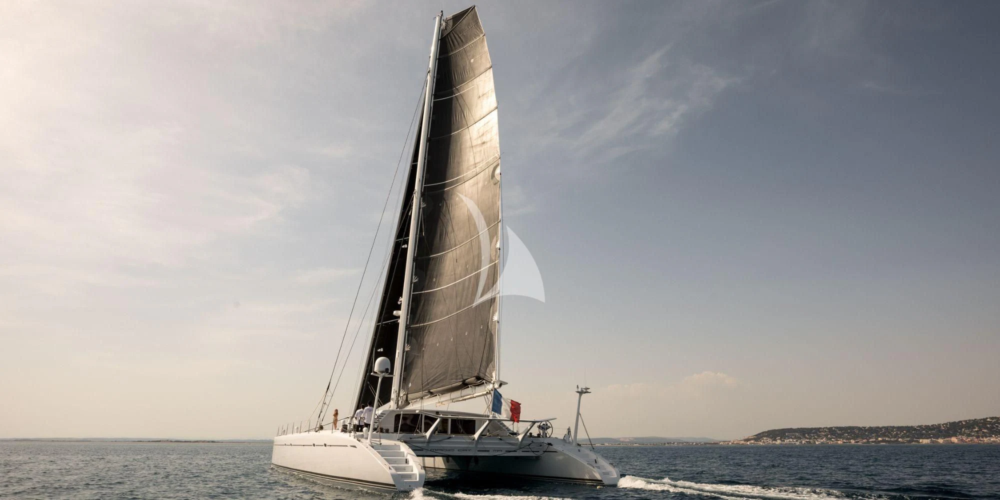 a sailboat on the water aboard MAGIC CAT Yacht for Sale