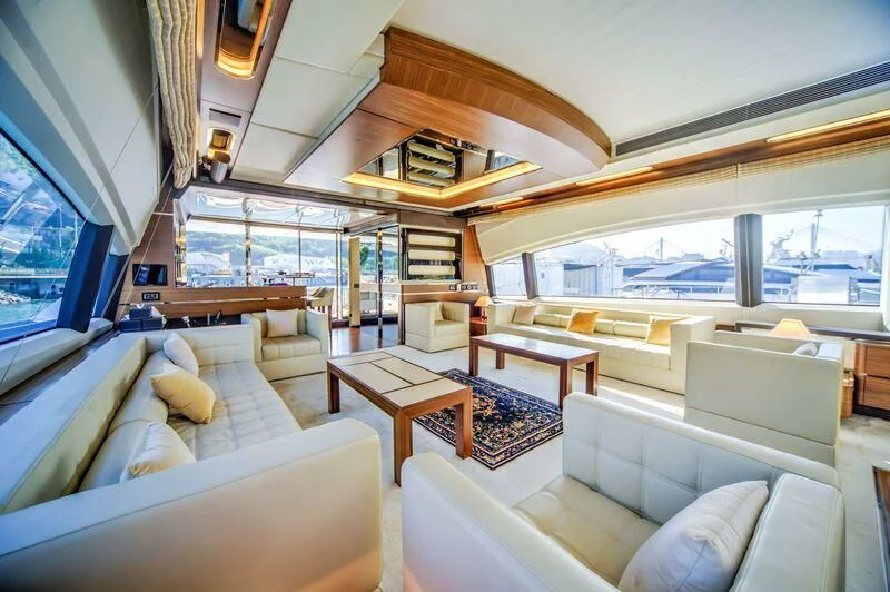a room with a couch and a table aboard YUZHOU Yacht for Sale