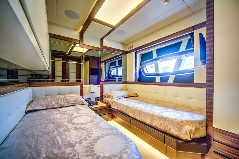 a room with two beds aboard YUZHOU Yacht for Sale