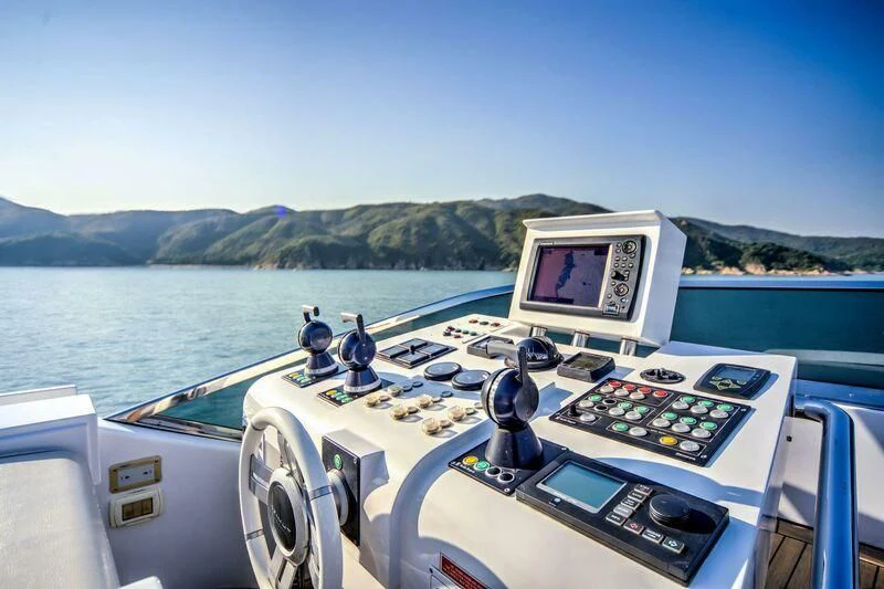 a boat with a computer monitor and a monitor on the front aboard YUZHOU Yacht for Sale