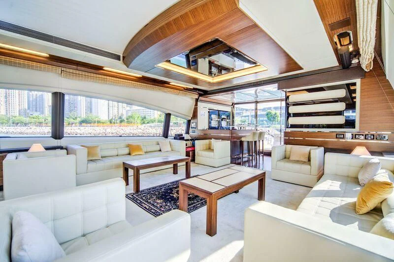 a living room with a large open window aboard YUZHOU Yacht for Sale