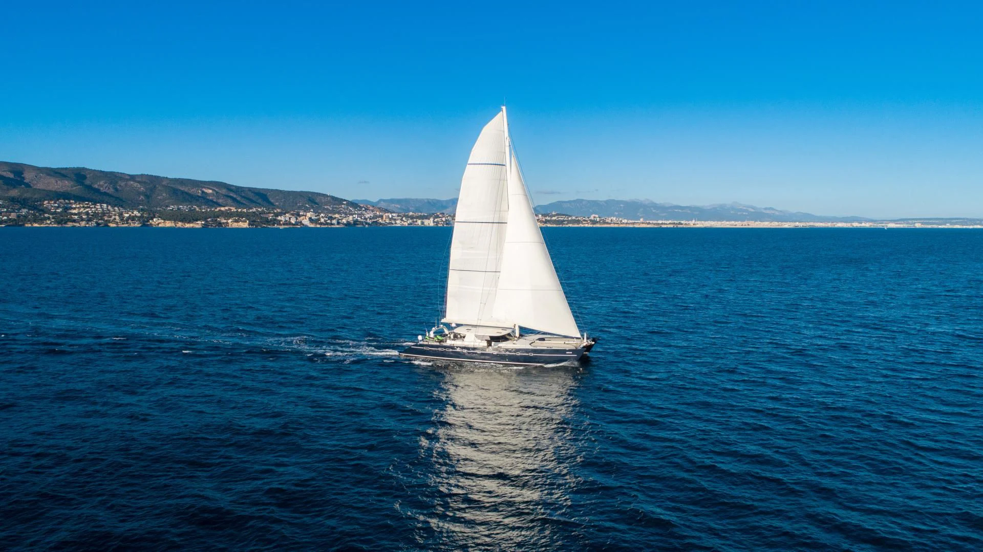 a sailboat on the water aboard MIROVIA Yacht for Charter