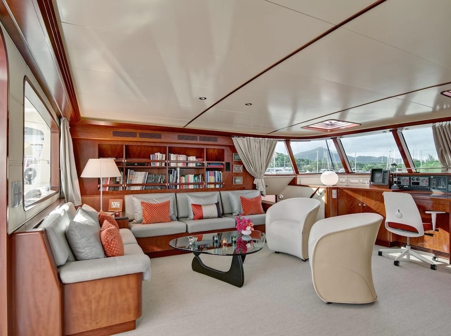 a living room with a couch and a table aboard MIROVIA Yacht for Charter