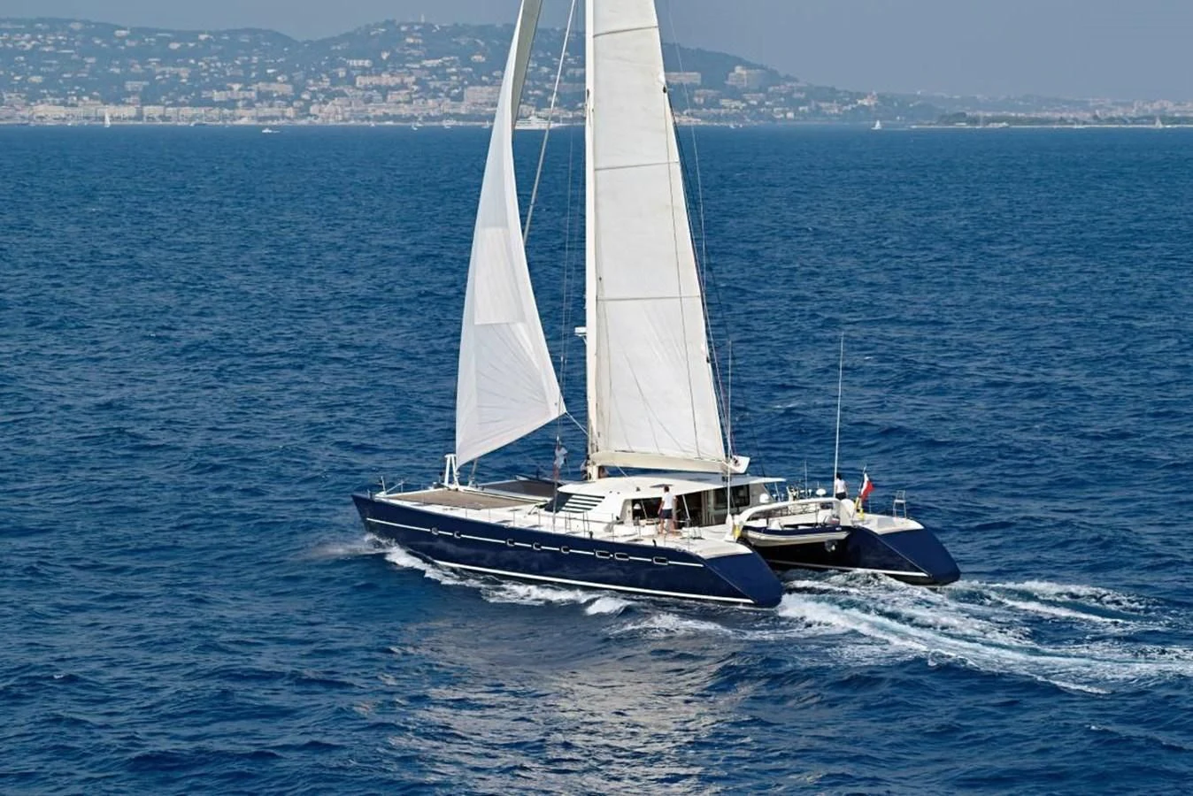 a couple of boats on the water aboard MIROVIA Yacht for Charter
