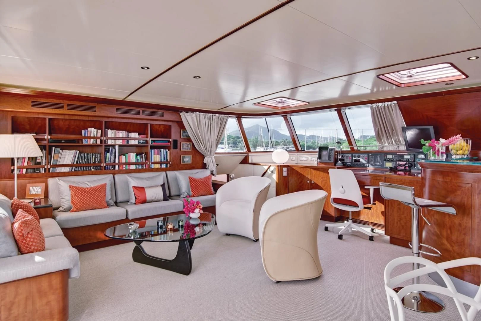 a living room with a couch and a table aboard MIROVIA Yacht for Charter