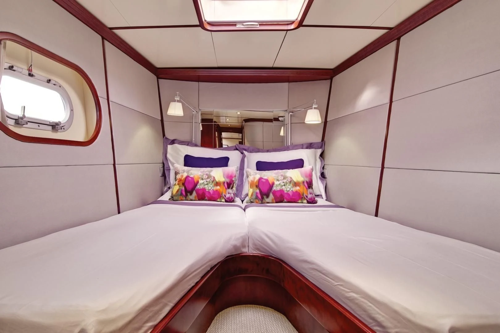 a couple of beds in a room aboard MIROVIA Yacht for Charter