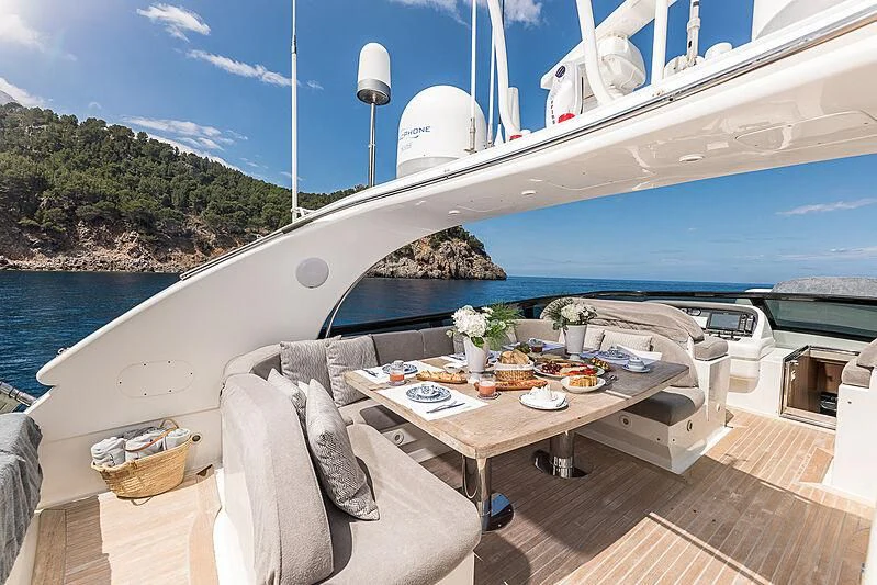 a table on a boat aboard POBEDY I Yacht for Sale