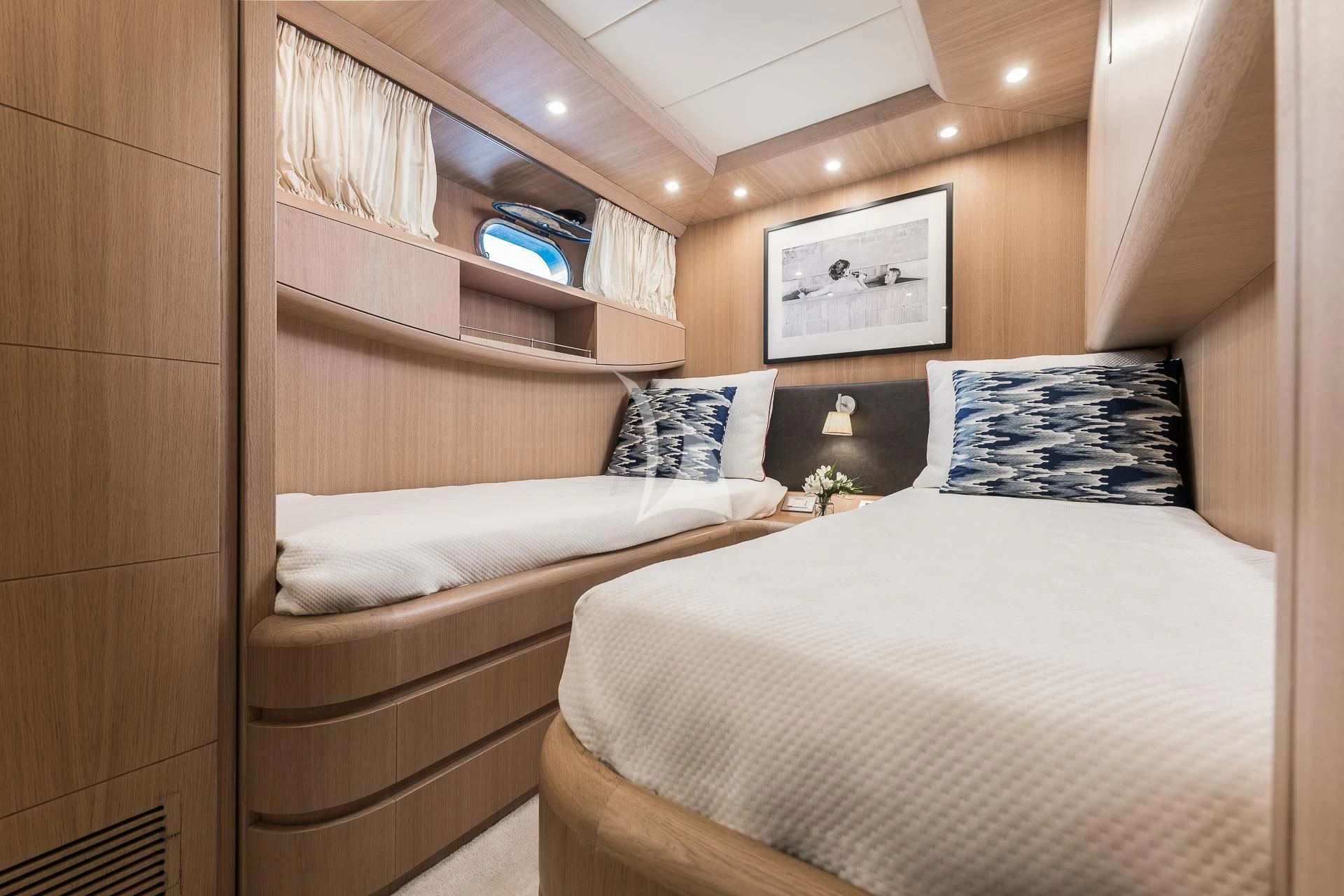 a room with two beds aboard POBEDY I Yacht for Sale