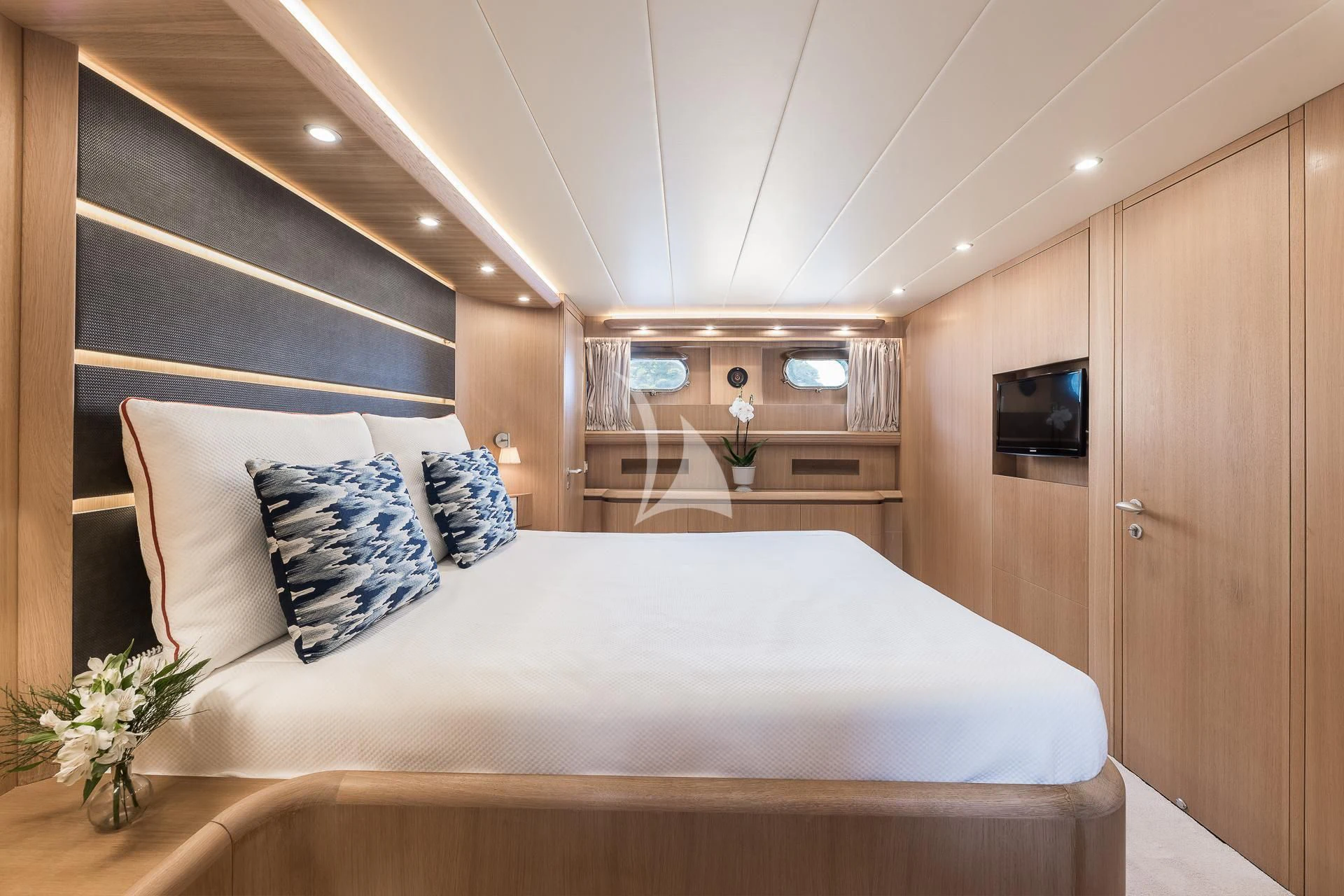 a bed in a room aboard POBEDY I Yacht for Sale