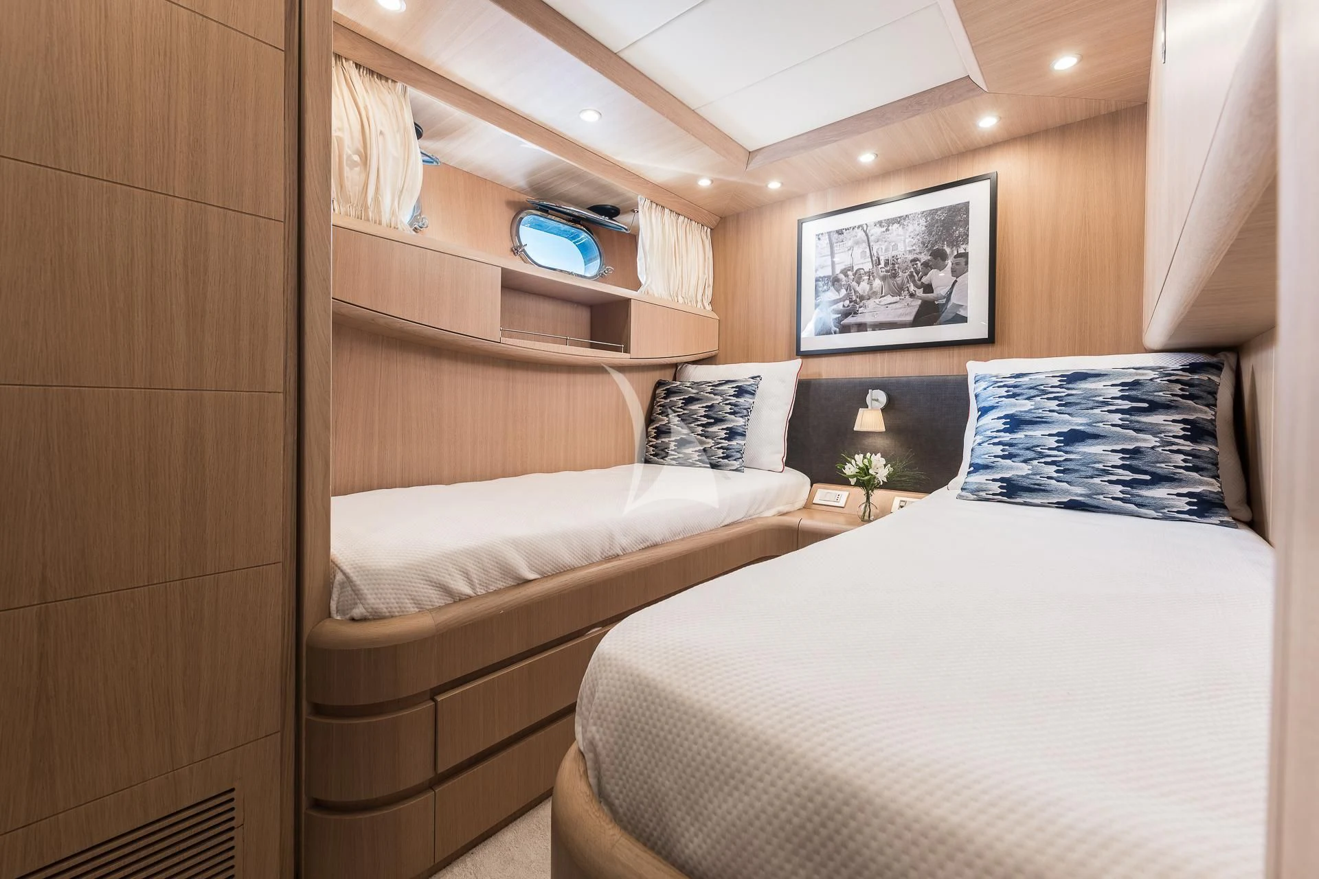 a room with two beds aboard POBEDY I Yacht for Sale