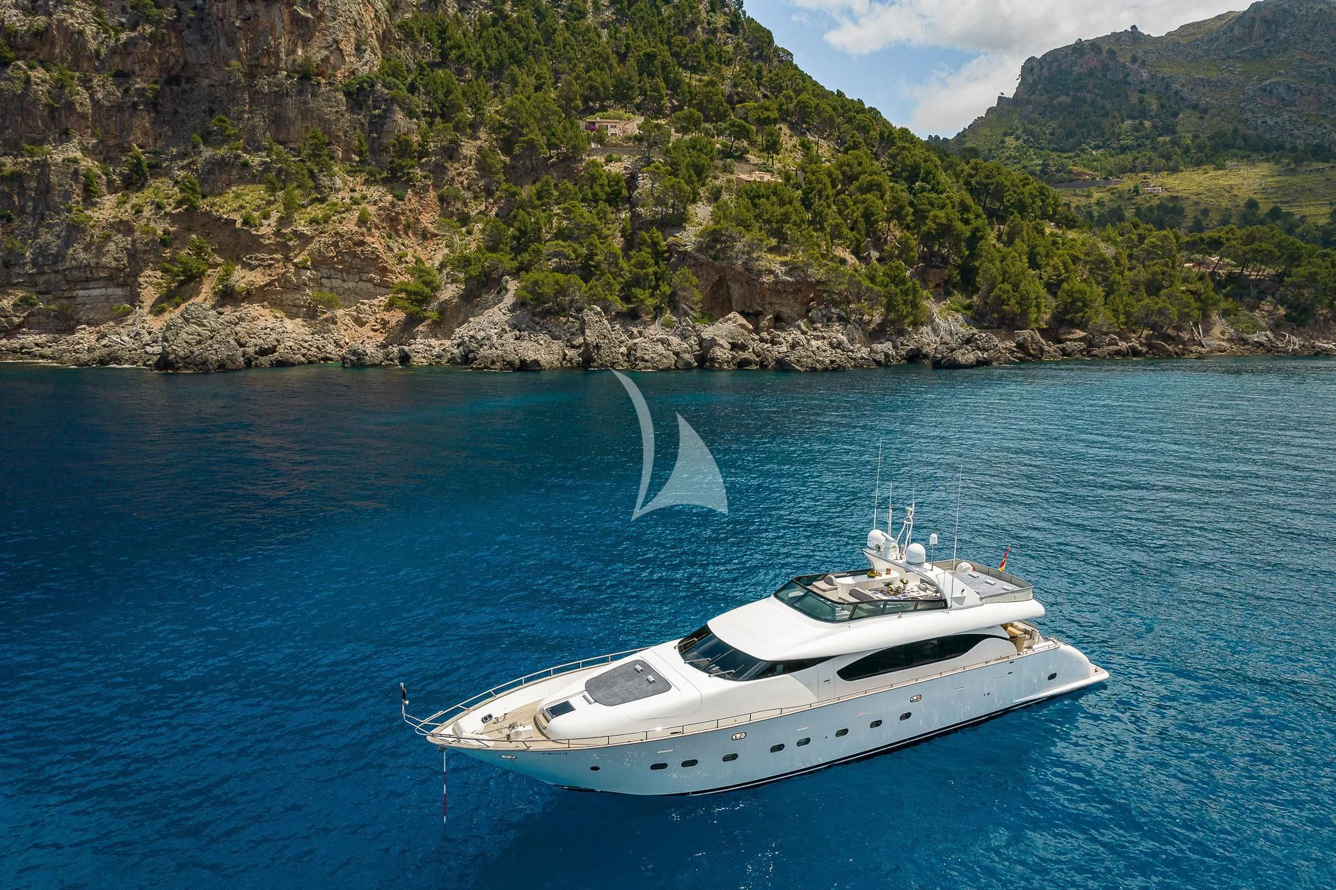a boat in the water aboard POBEDY I Yacht for Sale