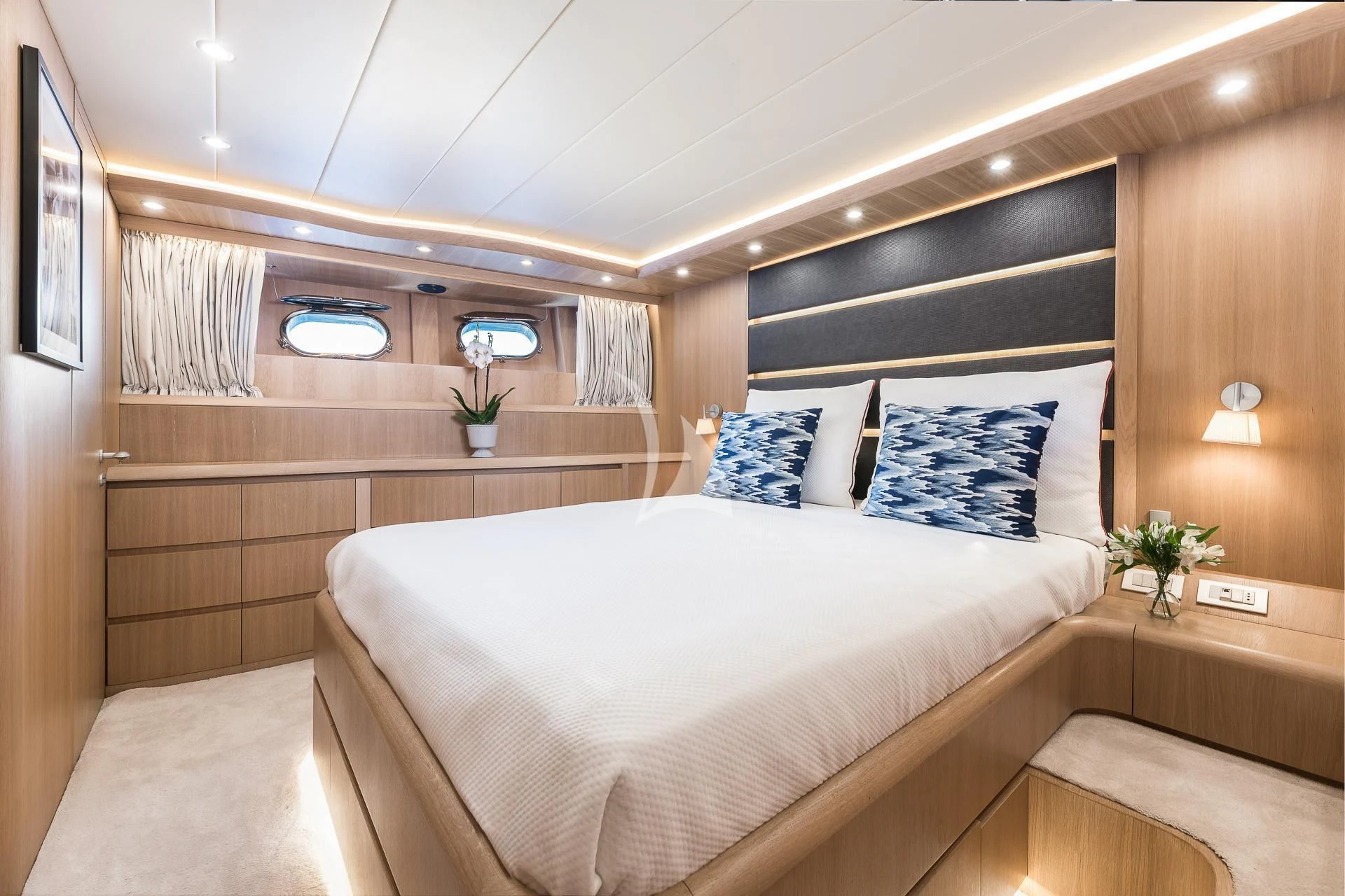 a room with a bed and a window aboard POBEDY I Yacht for Sale